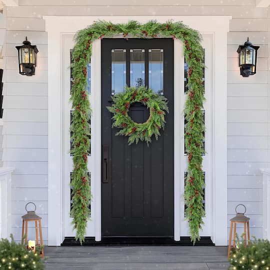 Glitzhome® 9ft. Christmas Greenery PE Dripping Cedar Garland with Red Berries, Set of 2